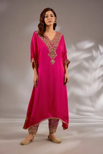 A-line kurta in satin organza base with dori hand embroidery.