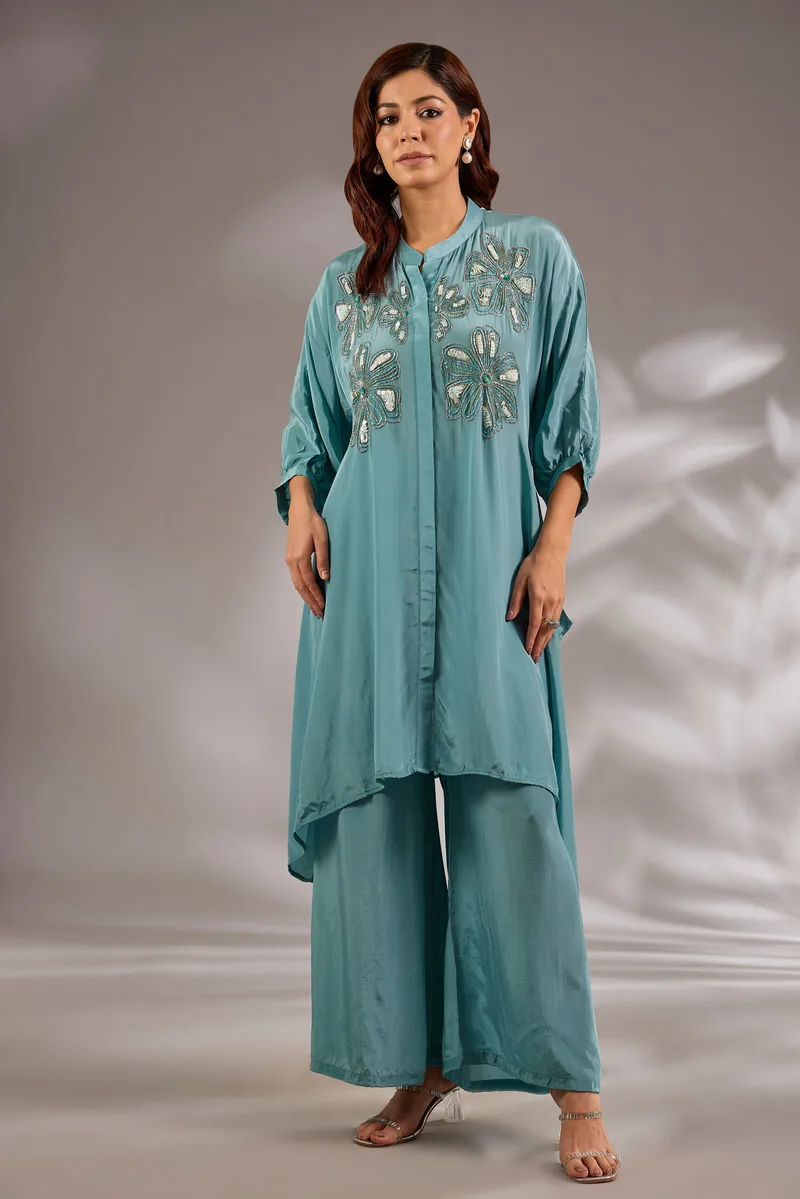 Asymmetric kurta in crepe base with sequins embroidery.